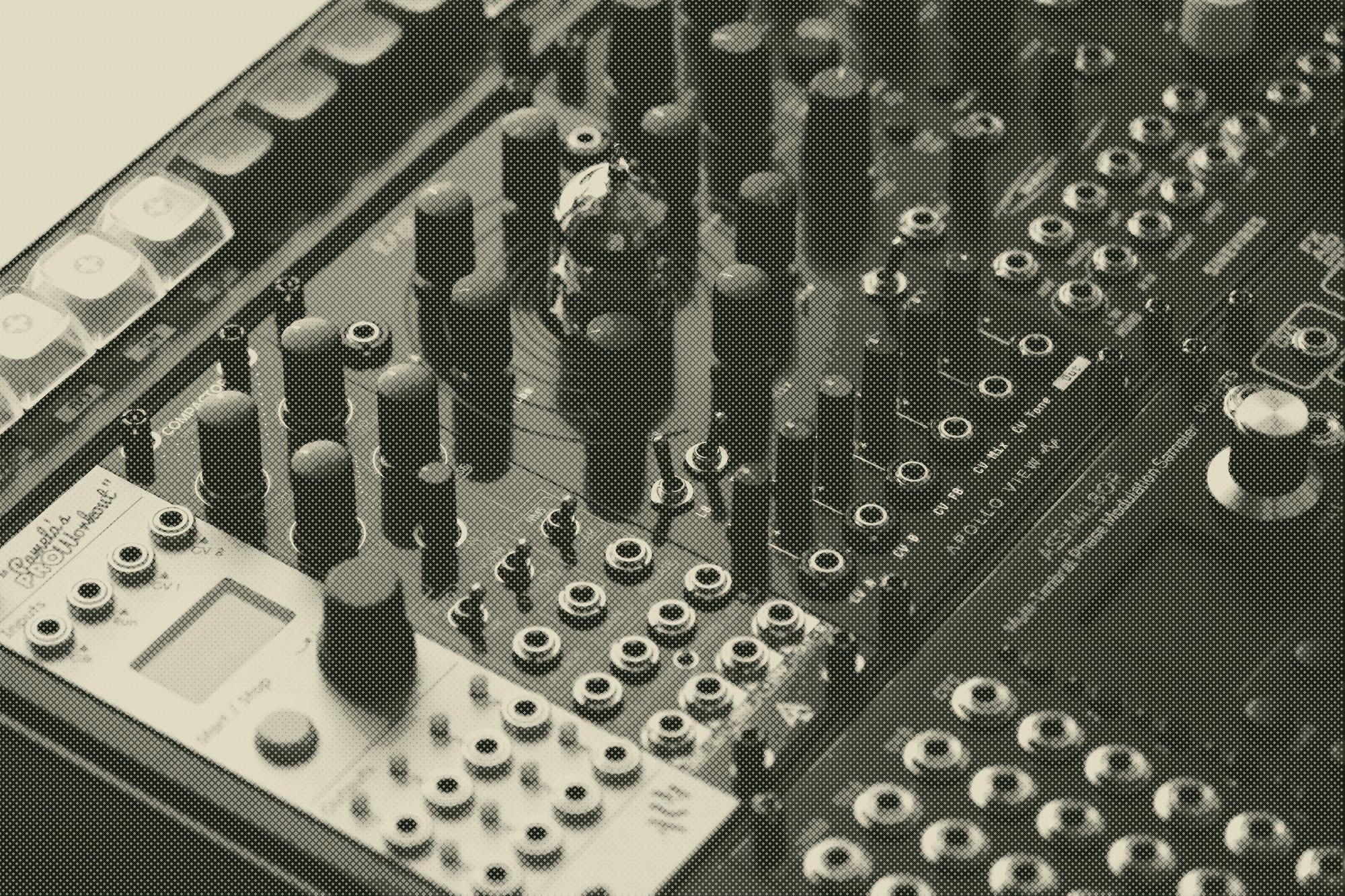 a close view of a modular synthesizer's controls
